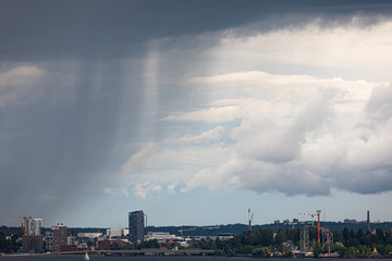 Summer day raining viewed from far