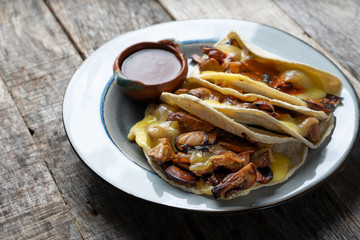 Mexican quesadillas with champignon mushrooms