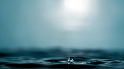 a drop on the surface of the water. One second before...