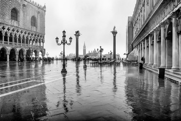 Naklejka premium Rain on Saint Marco Square in Venice, Italy. April 2012. Black and white photo