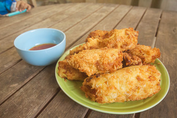 The sauce chicken,On a brown wood table,In Phuket Thailand