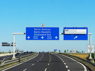 Germany, autobahn, traffic. Road to the center of Berlin, road signs
