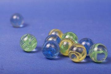 marbles on a blue background