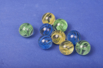 marbles on a blue background