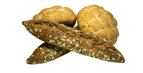 Side view of four breads baked with various seeds (pumpkin, flax, oatmeal, millet) isolated on a white background.