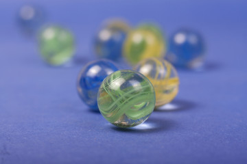 marbles on a blue background