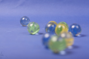 marbles on a blue background