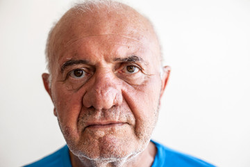 Elderly man face expression concept