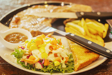 Pork steak in a delicious cafe in Bangkok Thailand