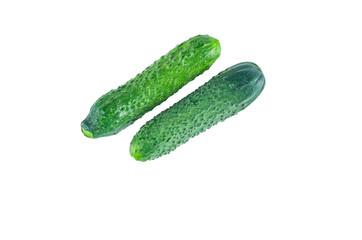 Fresh cucumbers isolated on white background. The view from the top. Background of organic food.
