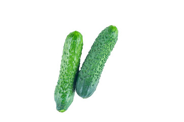 Fresh cucumbers isolated on white background. The view from the top. Background of organic food.