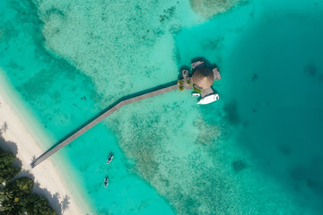 Aerial view of beautiful island at Maldives in the Indian Ocean. Top view from drone.