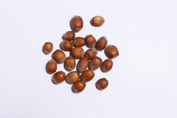 Top view of hazelnuts isolated on white background.