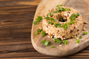 Cream cheese with green onion and herbs, dip sauce. Breakfast.