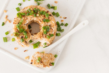 Cream cheese with green onion and herbs, dip sauce. Breakfast.