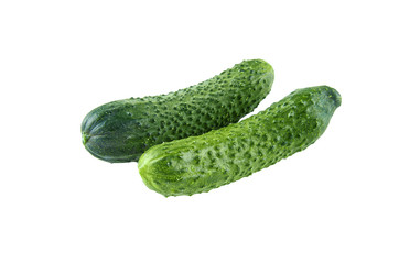 Fresh cucumbers isolated on white background. Background of organic food.