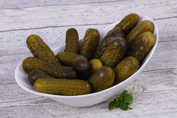 Pickled cucumbers heap in the bowl