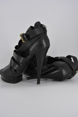 Sexy glamorous black women's sandals from genuine cowhide matte leather on high heels. Fashion...