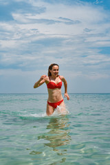 Beautiful girls in bikini on the beach