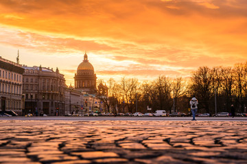 Sunset on the Palace Square in St. Petersburg, a golden sunset overlooking St. Isaac's Cathedral