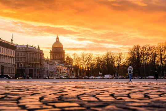 Sunset on the Palace Square in St. Petersburg, a golden sunset overlooking St. Isaac's Cathedral
