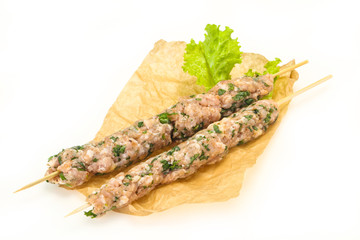 Raw minced pork skewer kebab for grill