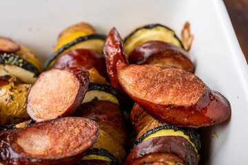Potato skewers with sausage and zucchini