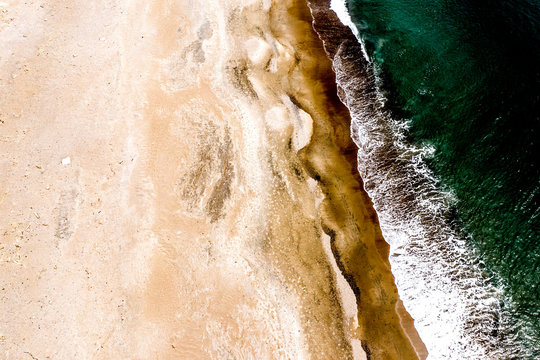 Aerial view of deserted beach and shoreline in Japan