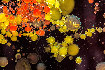 Colourful liquid bubbles abstract background. Macro photography