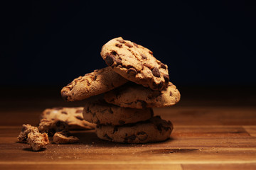 Chocolate cookies on wooden table. Chocolate chip cookies