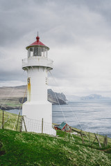 Fototapeta na wymiar A lighthouse on the Faroe Islands Mykines island