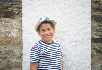 Portrait of a happy kid looking to the left