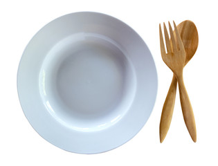 Dish with wooden utensils on a white background