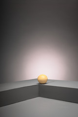 Lemon on grey box background