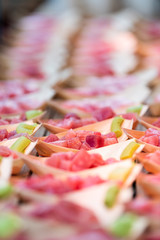 Tsukiji outer street market in Ginza, Tokyo Japan with retail display of tuna and wasabi sashimi...