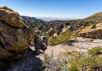 Hoodoos and Rock formations afford views of the valley below from the mountains of the Chiricahua National Monument in Southeastern Arizona.Chiricahua National Monument