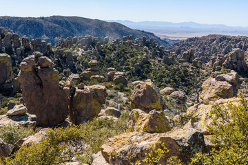 Hoodoos and Rock formations afford views of the valley below from the mountains of the Chiricahua National Monument in Southeastern Arizona.