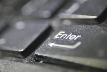 "enter" button on the laptop keyboard