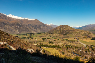 Fototapeta na wymiar Panoramic scenery og Queenstown New Zealand on the way back from the ski fields