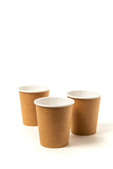 glasses of crafting paper for hot drinks on a white background
