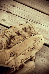Vintage Looking Sepia Antique Baseball Glove on Wood