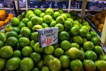 lemons stand in popular municipal market in Brazil with announced price of R$ 4,00 a kilo