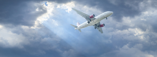 Commercial airplane flying in the sky