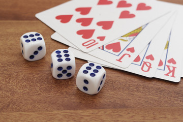 Gambling concept on wooden table