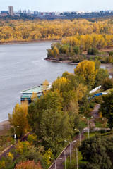 Fototapeta na wymiar Krasnoyarsk Russia, view of Yenisei river and parkland with autumn colors with city in background