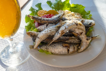 Deep Fried Sardines Served with Beer