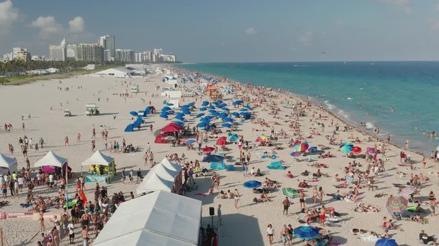 People enjoying the South Beach, in Miami Beach, Florida
