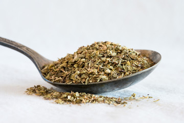 Dried Oregano Spill from a Vintage Spoon