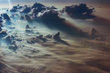 cloud and sky view from the window of an airplane