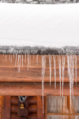 Icicles hanging from a roof